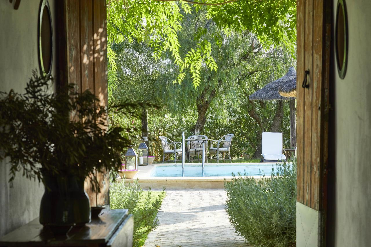 Отель Hacienda De San Rafael Лас-Кабесас-де-Сан-Хуан Экстерьер фото